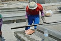 Pebble washworks by construction workers